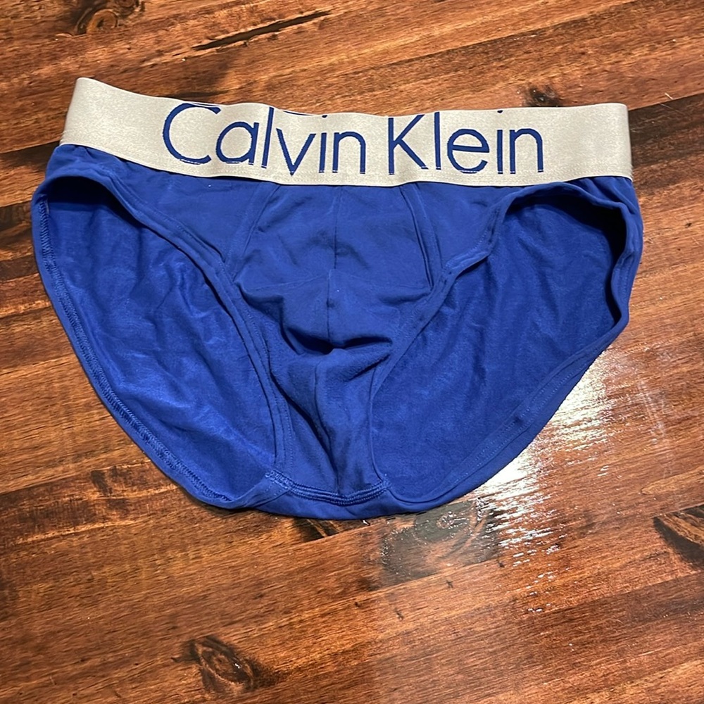 NWOT. Calvin Klein men’s briefs, size Med. Royal blue